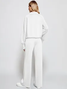 Details of white womens half-zip sweatshirt and wide leg pants casual two piece loungewear.