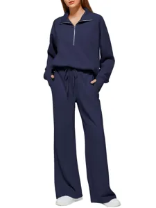Close-up of the stylish half-zip sweatshirt and wide-leg sweatpants loungewear set.