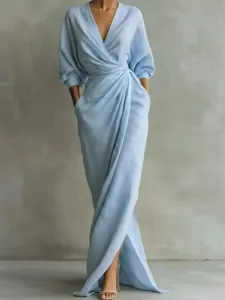 Light blue V-neck maxi dress with draped waist and long sleeves, perfect for summer vacation.