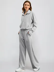 Women grey half-zip sweatshirt wide-leg sweatpants set. Comfortable daily casual lounge wear detail view.