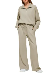 Detail view of the women casual half zip sweatshirt and wide leg pants set in khaki.