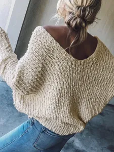 Chunky knit V-neck sweater detail, casual long sleeve pullover, cozy lifestyle fashion style.