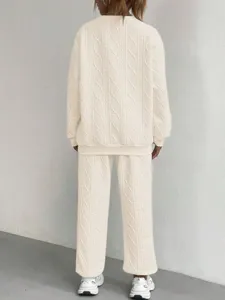 Close-up detail of the cozy ribbed knit two piece set back view in neutral tone.
