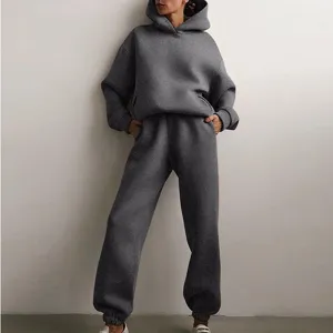 Detailed full-body view of the thick solid color hoodie and sweatpants tracksuit set.