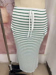 Green and white striped knit bodycon skirt with drawstring waist and pockets for women.