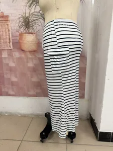 Black and white striped knit bodycon long skirt with side pocket detail in detail view