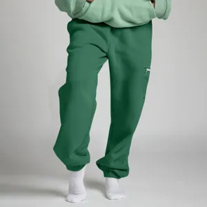 Tuta casual tinta unita con felpa con cappuccio e pantaloni della tuta per autunno e inverno.