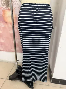 Black and white striped knit slim fit bodycon midi skirt with practical side pockets