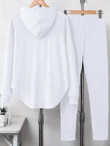 Solid white women long sleeve hooded sweatshirt and long pants loungewear two piece set.