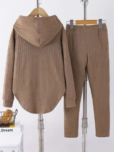 Detail view of the brown crinkle textured casual loungewear two-piece set featuring a hoodie.
