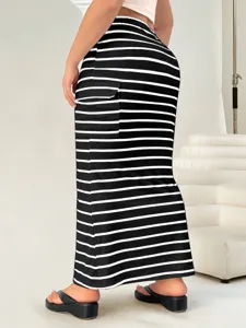 Side detail of black and white striped knit bodycon maxi skirt with utility cargo pocket.