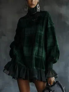 Elegantes grünes kariertes langarm Kleid mit schwarzem Mesh Rüschensaum für Damen Mode.