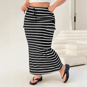 Plus size striped knit maxi skirt with drawstring and pockets, perfect for casual summer wear.