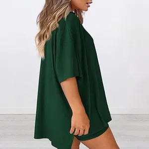 Casual green short sleeve t-shirt and shorts loungewear set detail view, soft relaxed fit.