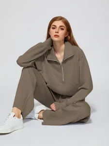Women's two-piece half-zip sweatshirt and wide-leg sweatpants casual suit for everyday wear.