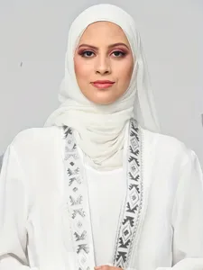 White Muslim women abaya dress with hijab matching set, elegant long sleeve modest maxi robe.