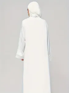 Elegant white long sleeve abaya maxi dress with neckline embroidery and matching hijab back view.