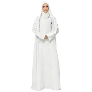 White long abaya dress and cardigan two-piece set with elegant front embroidery and matching hijab for women.