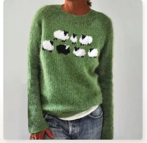 Green wool knit sweater for women featuring cute black and white sheep pattern long sleeves.