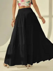 Back view detail of women's black tiered maxi skirt, high waist pleated design, elegant flow