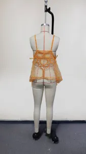 Backless sheer rhinestone camisole detail showing the sparkling beaded back design clearly.