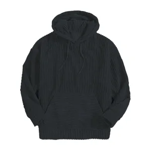Detailed view of the black corduroy fabric, cozy hood with drawstrings and pocket.