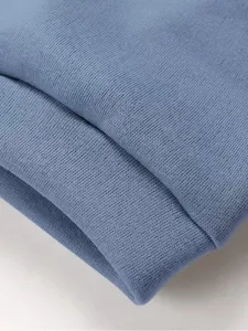 Soft blue fleece fabric detail texture close-up view comfortable textile material