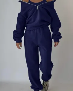 Dark blue fleece tracksuit set for women, casual zip sweatshirt and comfortable sweatpants.