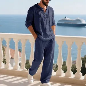 Casual men's linen long sleeve hooded henley shirt and matching trousers outfit set for autumn.