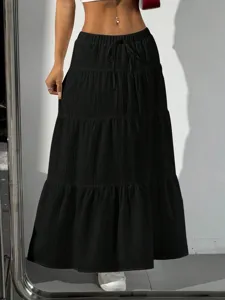 Black tiered maxi skirt with drawstring waist, casual long skirt, comfortable everyday wear.