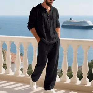 Men's casual linen suit detail, loose hooded long sleeve henley shirt and trousers.