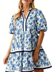 Blue and white floral tiered mini dress featuring short puff sleeves and stylish V-neck trim.