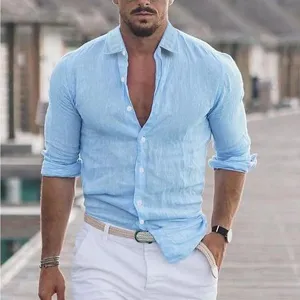 Men's casual long sleeve linen shirt detail, light blue cotton blend beach wear fabric.