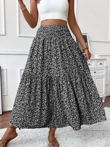 Detailed shot of the stylish floral tiered maxi skirt showing the beautiful pattern and fabric.