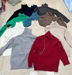 Pull en tricot à col roulé oversize pour femme, haut décontracté ample chaud d'hiver couleur unie.