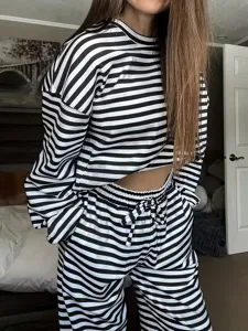 Black and white striped long sleeve crop top and high waist pants lounge set for women.