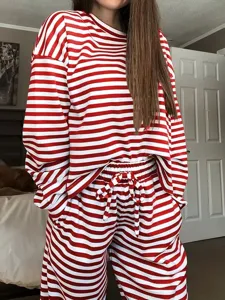 Red and white striped long sleeve top and high waist casual pants lounge set detail view.
