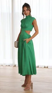 Stunning green sleeveless midi dress with chic waist cutouts and elegant pleated detailing.