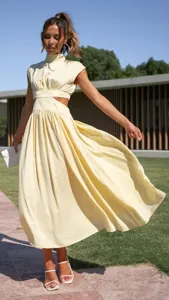 Summer cutout midi dress feature high neck and elegant flared skirt detail outdoor style scene.