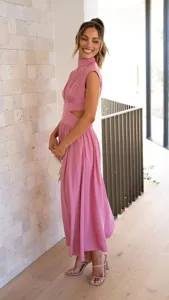 Pink high neck sleeveless cutout maxi dress detail showcasing stylish street fashion look.