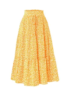 Yellow floral tiered maxi skirt, high waist with drawstring, elegant bohemian flowy design.