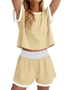 Casual two-piece loungewear set featuring a contrasting o-neck short sleeve top and shorts.