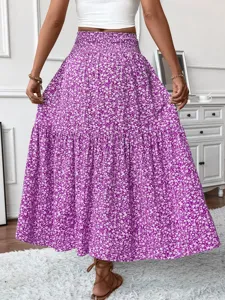Detailed view of the purple floral tiered maxi skirt, featuring high waist and pleated hem.