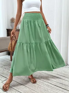 Green high waist tiered maxi skirt for women, casual long skirt with smocked elastic waist.