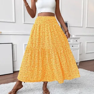 Floral tiered maxi skirt for women, bohemian high waist long summer skirt in orange.