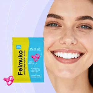 Feimuko hands free dental floss detail view showing product pouch and clean teeth model.