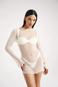 White sheer knit beach dress with long sleeves, sexy tight mini bodycon dress detail.