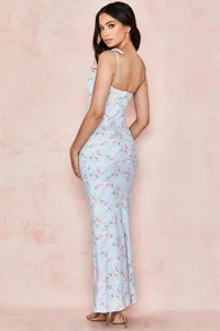 Detailed back view of the light blue floral sleeveless bodycon long dress with delicate straps.