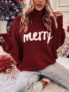 Close-up detail of the cozy burgundy turtleneck sweater featuring white merry knit lettering.