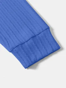 Close-up view of the blue vertical striped knit sleeve, showing fine ribbed cuff and texture.